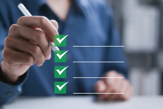 Checklist concept, Quiz question answering, online survey form completion corporate. Businessman checking checkboxes on virtual screen.