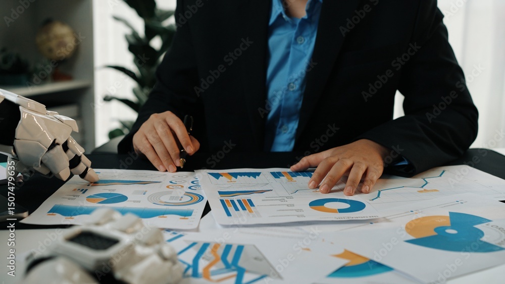 Poster a business professional examines various graphs and data charts while utilizing futuristic technolog