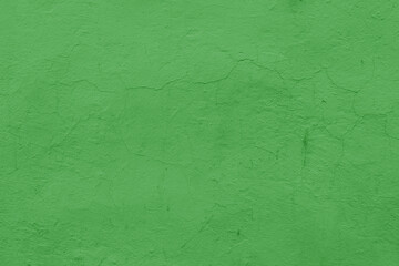 Surface of old, damaged paint on the wall.