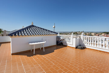 Panoramic View Over Rooftops and Countryside