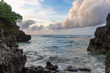 Nature vacation background, sunset at Padang Padang Beach in Bali Indonesia