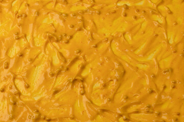 Yellow sauce splashes as a background.