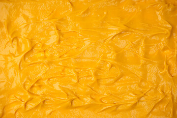 Yellow sauce splashes as a background.
