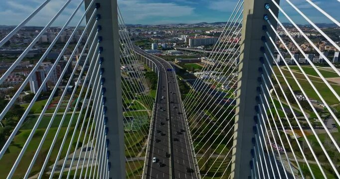 Aerial view of Vasco da Gama bridge crossing the Tagus river in Lisbon, Portugal. Modern design