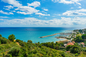 Naklejka premium Coastal View of Laigueglia, Liguria, Italy. Marina and Blue Sea Landscape