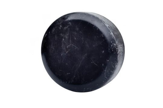 Scratched hockey puck isolated on transparent background