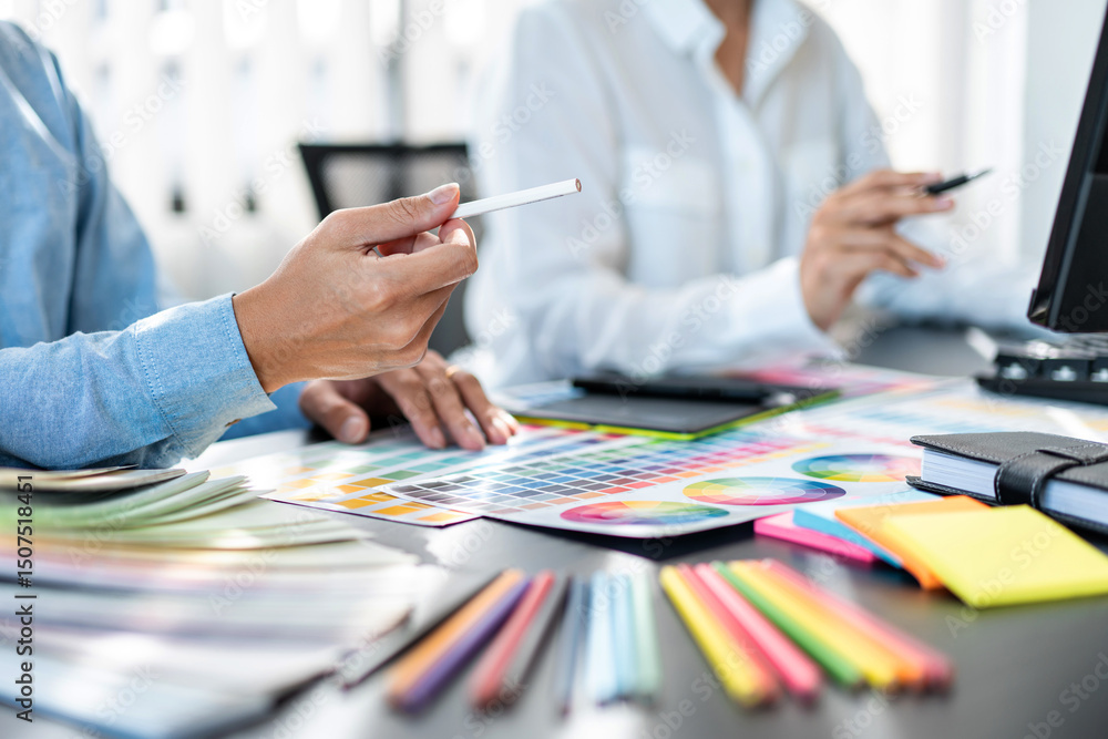 Poster two creative graphic designer team working on color selection and drawing on graphic tablet, color s