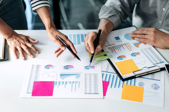 Business team colleagues consultation and discussion marketing plan meeting on the financial report and analyzing investment project to development grow to success