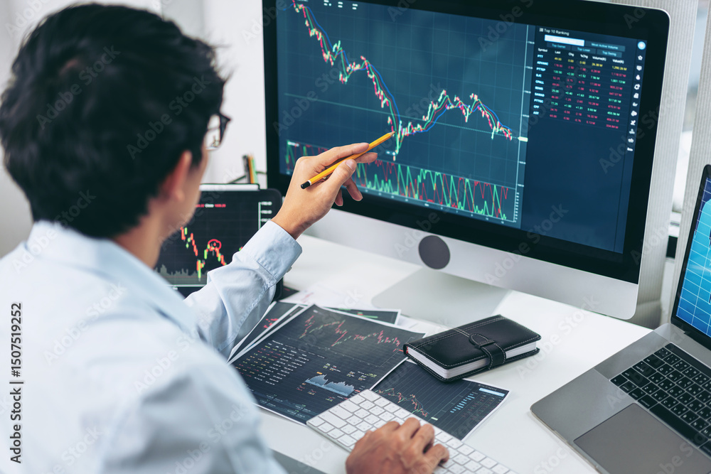 Poster businessman investor working with computer, tablet and analyzing graph stock market trading planning