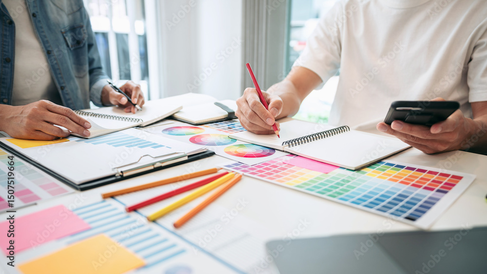 Poster two creative graphic designer team working on color selection and drawing on graphic tablet, color s
