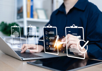 Document review and quality control process. Woman using laptop, document review and quality...