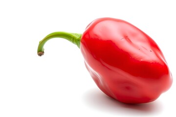 Single fresh red aji pepper isolated on white background