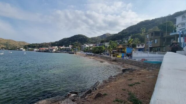  Shoreline of Taboga Island with boats and waterfront houses