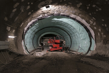 view of an excavator with a platform used in tunnel excavation