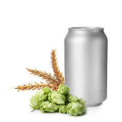 Fresh beer in can with hop flowers and ears of wheat on white background