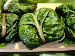Swiss Chard rolls. Swiss Chard - Sarma -. Balkan traditional food, meat, rice and spices rolled in Swiss Chard leaves
