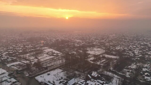Sunset serenity: Drone footage of a srinagar city in winter