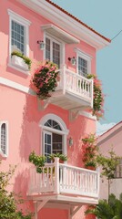 Fototapeta premium Colorful House With Pink Facade and Flower-Filled Balconies in a Sunny Neighborhood