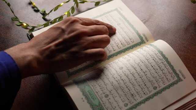 Man Engaged in Quran Study