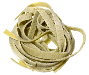 Nest of dry green egg pasta tagliatelle with spinach, isolated background