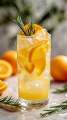Fototapeta premium Refreshing Citrus Drink With Ice and Rosemary on a Marble Surface