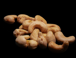 cashew nuts on black background