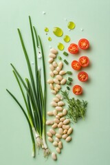Flat lay of salad with cannellini beans, cherry tomatoes, green onions, herbs, and olive oil arranged artistically. Concepts of healthy food, salad, food art, deconstructed presentation, food flat lay