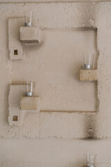 old stone wall and candles, interior decoration for spa or beauty salon