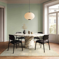 Modern dining room with light green walls a white marble table and black chairs A vintage pendant light fixture hangs above the round stone tabletop A carpet