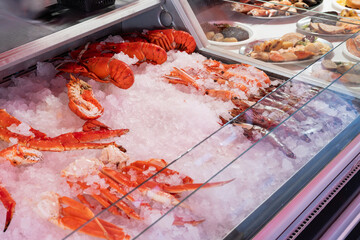 Vibrant display case of a Norwegian fish market, showcasing an abundance of the freshest seafood: appetizing lobsters, crabs, and shrimp, beautifully arranged on crushed ice.
