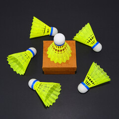 badminton rackets on black background close-up view group objects sports accessories concept 