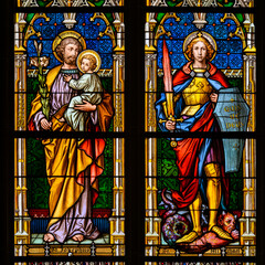 St Joseph with the Christ Child and St Michael the Archangel. A stained-glass window in the Cathedral of St Elizabeth in Košice, Slovakia.
