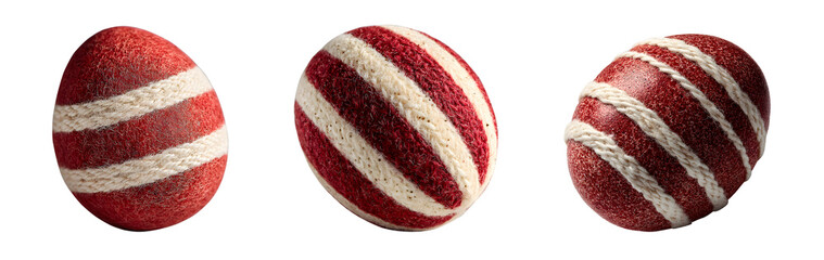 Three red and white striped easter eggs made of yarn, isolated on transparent background, perfect for spring holiday decorations and crafts