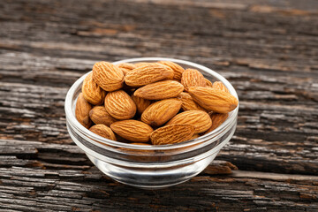 Dried almond nuts in a bowl - Prunus dulcis