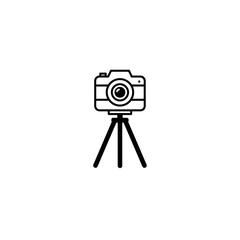 Camera on tripod in minimalist design style for photography concept  