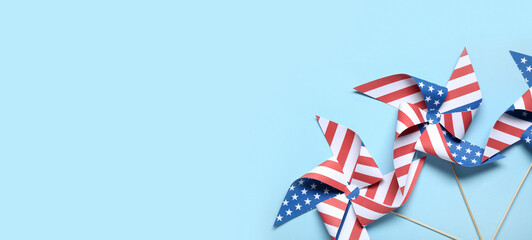 Pinwheels made of USA flags on blue background. Independence Day celebration
