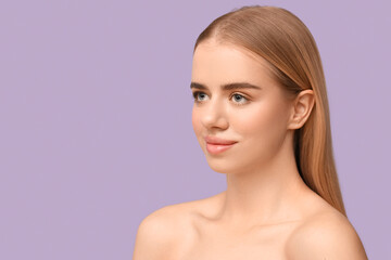 Young woman with beautiful lips on lilac background