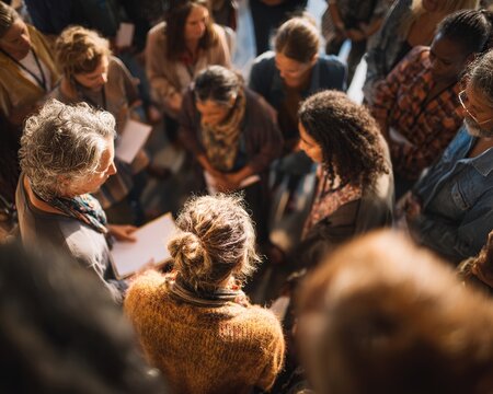 Diverse group meeting indoors.