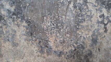 Old grunge concrete surface with weathered cement texture and rough stone patterns, ideal for industrial backgrounds	