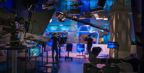 abstract blurred background with tv equipment in tv studio
