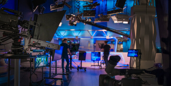 abstract blurred background with tv equipment in tv studio