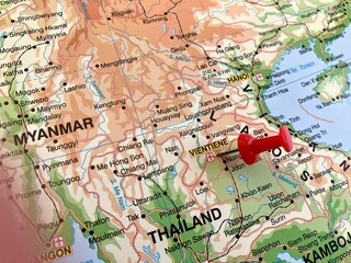 Obraz premium view of Vientiane, Capital of Laos, on a geographical map of Asia, marked with red pushpin
