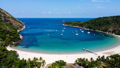 Obraz premium Serene Tropical Beach with Sailboats in Crystal Clear Water