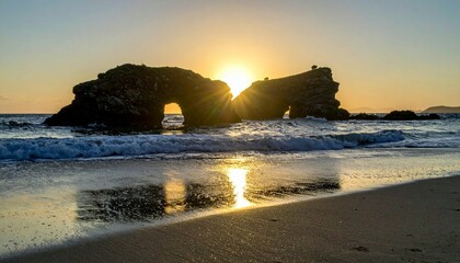 Stunning Sunset Over Rock Formation at Serene Beach Landscape