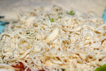 Shredded Chicken Salad Sandwich. Meal with Chicken, Tomato, Lettuce. Delicious Lunch with Selective Focus. Shredded Chicken with selective focus.