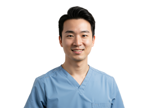 Young Asian male doctor or nurse in blue scrubs smiling confidently at the camera. Healthcare professional portrait, isolated on a transparent background. Medical worker offering friendly service.