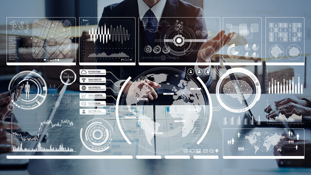 Group of business people meeting and digital technology concept. Wide angle visual for banners or advertisements.