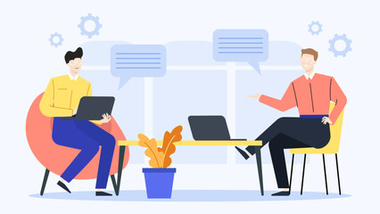 Two men working with laptops at a desk with a plant. Suitable for business articles, co-working spaces, technology websites.