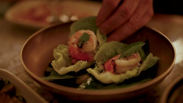 Preparing Miang Kham with Shrimp in Warm Lighting