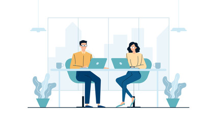 Two people working on laptops at a desk. Suitable for illustrating teamwork, collaboration, remote work, technology, and modern workplace concepts.